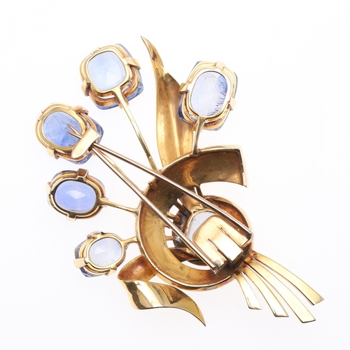 308 - A SAPPHIRE AND GOLD FOLIATE SPRAY BROOCH. mounted with six sapphires of cushion and rounded rectangu... 