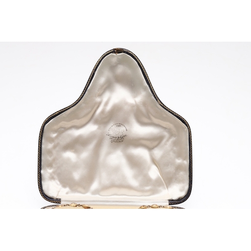 325 - AN EARLY VICTORIAN TOPAZ SUITE OF JEWELLERY. comprising a riviere necklace, mounted with circular to... 