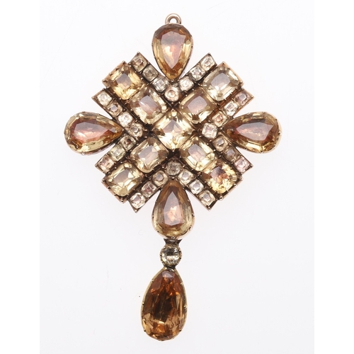 325 - AN EARLY VICTORIAN TOPAZ SUITE OF JEWELLERY. comprising a riviere necklace, mounted with circular to... 