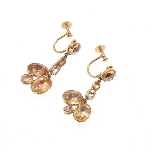 325 - AN EARLY VICTORIAN TOPAZ SUITE OF JEWELLERY. comprising a riviere necklace, mounted with circular to... 