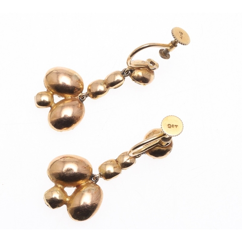 325 - AN EARLY VICTORIAN TOPAZ SUITE OF JEWELLERY. comprising a riviere necklace, mounted with circular to... 