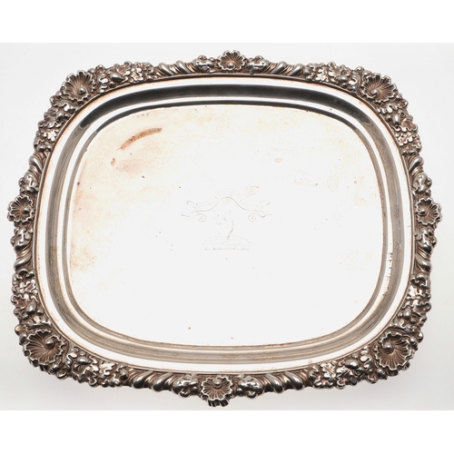 40 - A PAIR OF GEORGE III RECTANGULAR SILVER SALVERS. With cast foliate motif borders and engraved centra... 