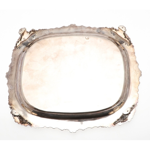 40 - A PAIR OF GEORGE III RECTANGULAR SILVER SALVERS. With cast foliate motif borders and engraved centra... 