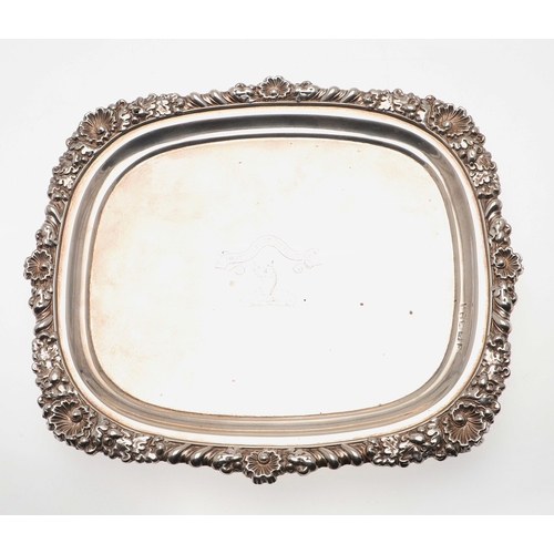 40 - A PAIR OF GEORGE III RECTANGULAR SILVER SALVERS. With cast foliate motif borders and engraved centra... 