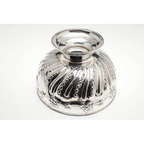 41 - AN EARLY 20TH CENTURY SILVER ROSE BOWL, MILITARY INTEREST. Of circular form with embossed lobes and ... 
