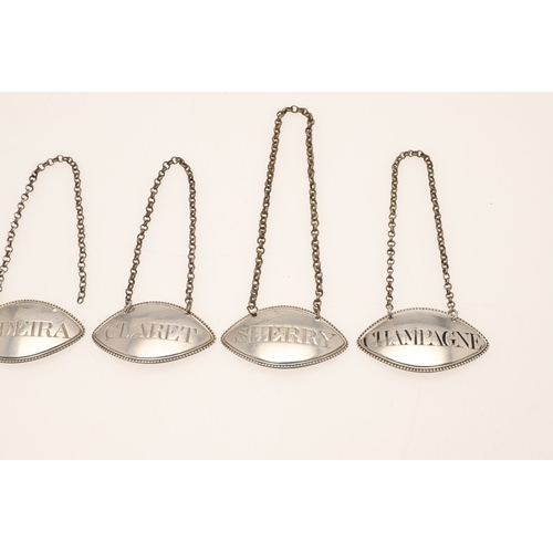 48 - A SET OF FIVE 18TH CENTURY SILVER WINE LABELS. Of oval form, featuring 'Claret', 'Champagne', 'Hock'... 