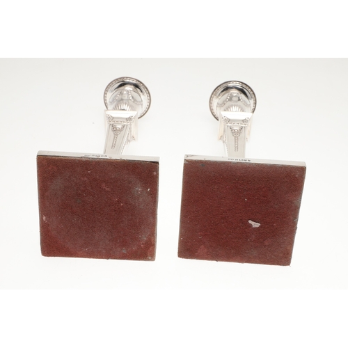 60 - A PAIR OF VICTORIAN SILVER CANDLESTICKS. Each candlestick with a beaded circular sconce, urn shaped ... 