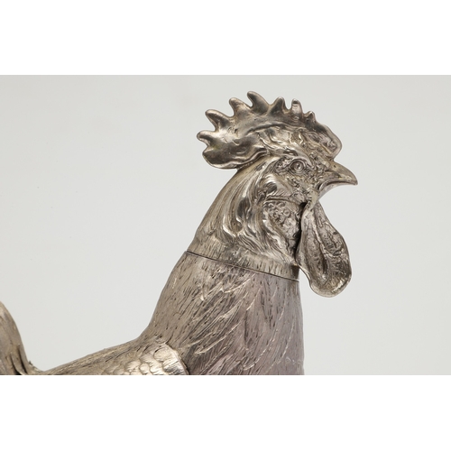 69 - A PAIR OF EARLY 20TH CENTURY IMPORTED SILVER STUDIES OF COCKERELS. Of the same pose, with foreign ma... 
