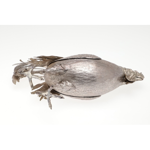 69 - A PAIR OF EARLY 20TH CENTURY IMPORTED SILVER STUDIES OF COCKERELS. Of the same pose, with foreign ma... 