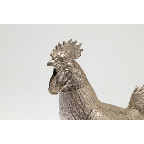 69 - A PAIR OF EARLY 20TH CENTURY IMPORTED SILVER STUDIES OF COCKERELS. Of the same pose, with foreign ma... 