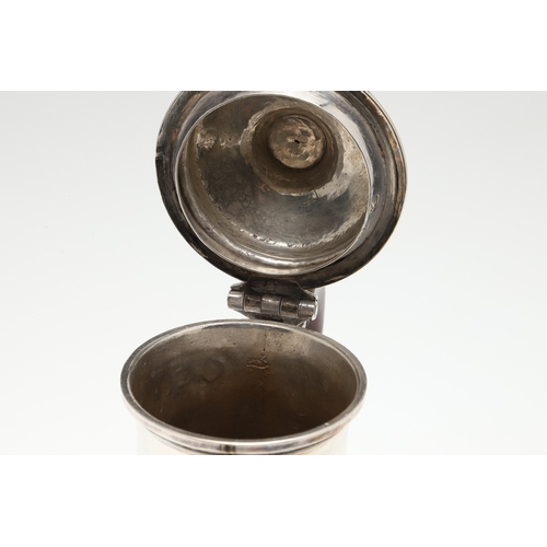 74 - A LATE GEORGE II SILVER COFFEE POT. Of plain baluster form, with scroll handle and round foot, the l... 