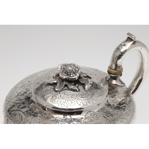 78 - A WILLIAM IV SILVER TEAPOT. Featuring engraved foliate and cartouche decoration (with crest), on fou... 