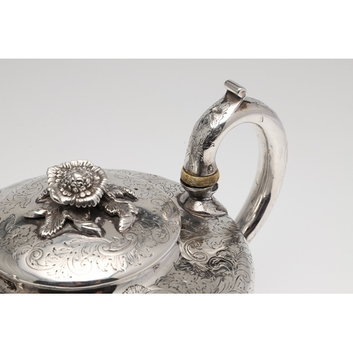78 - A WILLIAM IV SILVER TEAPOT. Featuring engraved foliate and cartouche decoration (with crest), on fou... 