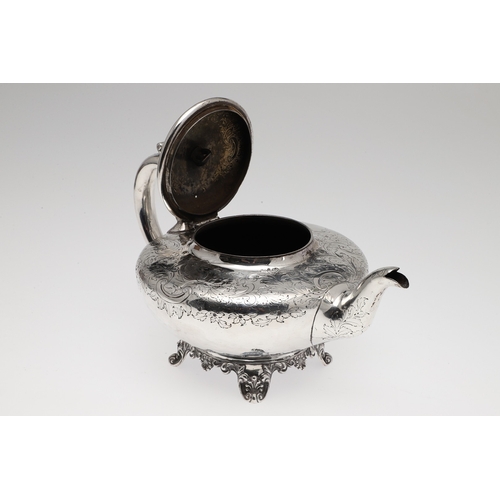 78 - A WILLIAM IV SILVER TEAPOT. Featuring engraved foliate and cartouche decoration (with crest), on fou... 