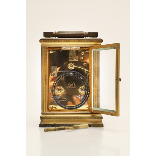 395 - A 19TH CENTURY FRENCH REPEATER CARRIAGE CLOCK. the enamel dial with Roman numerals, signed Reid & So... 