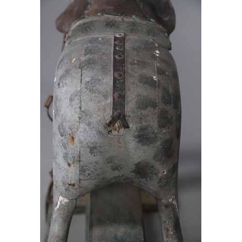 19TH CENTURY DAPPLE GREY ROCKING HORSE. with original leather and iron ...