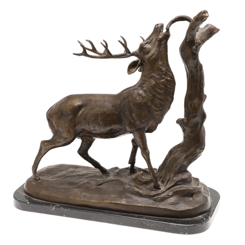 419 - AFTER PIERRE JULES MENE, EARLY 20TH CENTURY PATINATED BRONZE OF A STAG. modelled to a naturalistic b... 