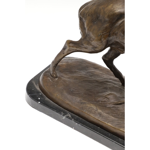 419 - AFTER PIERRE JULES MENE, EARLY 20TH CENTURY PATINATED BRONZE OF A STAG. modelled to a naturalistic b... 