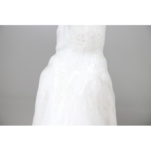 427 - A PAIR OF ITALIAN LIFE-SIZE CRACKLE GLAZE POTTERY GREYHOUNDS AND CUSHION BASES. in seated pose with ... 