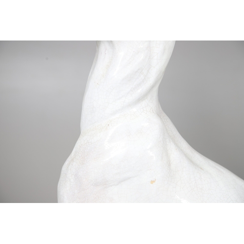 427 - A PAIR OF ITALIAN LIFE-SIZE CRACKLE GLAZE POTTERY GREYHOUNDS AND CUSHION BASES. in seated pose with ... 