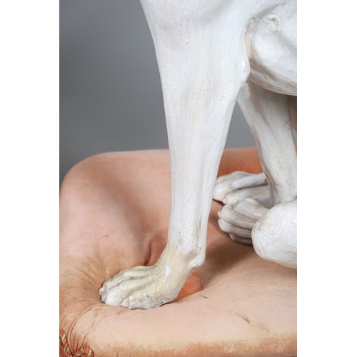 427 - A PAIR OF ITALIAN LIFE-SIZE CRACKLE GLAZE POTTERY GREYHOUNDS AND CUSHION BASES. in seated pose with ... 