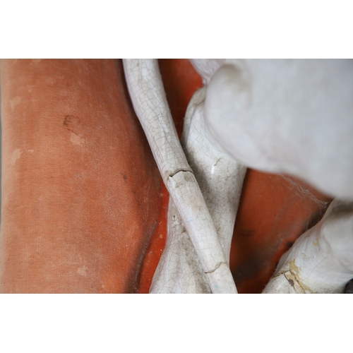427 - A PAIR OF ITALIAN LIFE-SIZE CRACKLE GLAZE POTTERY GREYHOUNDS AND CUSHION BASES. in seated pose with ... 