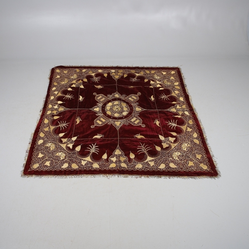 439 - A 19TH CENTURY TURKISH LONG THREAD TABLECLOTH. the embroidered bird and foliate design in gold metal... 