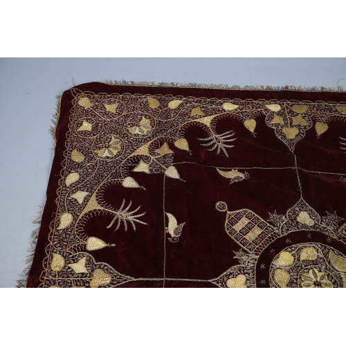 439 - A 19TH CENTURY TURKISH LONG THREAD TABLECLOTH. the embroidered bird and foliate design in gold metal... 