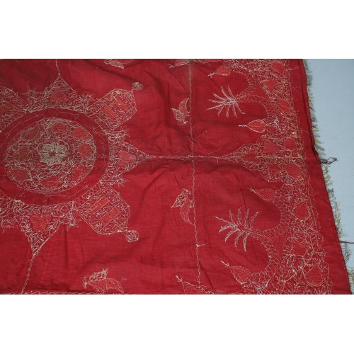 439 - A 19TH CENTURY TURKISH LONG THREAD TABLECLOTH. the embroidered bird and foliate design in gold metal... 