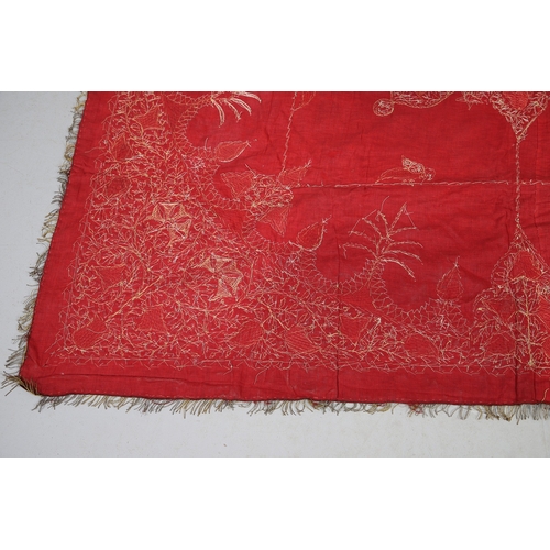 439 - A 19TH CENTURY TURKISH LONG THREAD TABLECLOTH. the embroidered bird and foliate design in gold metal... 