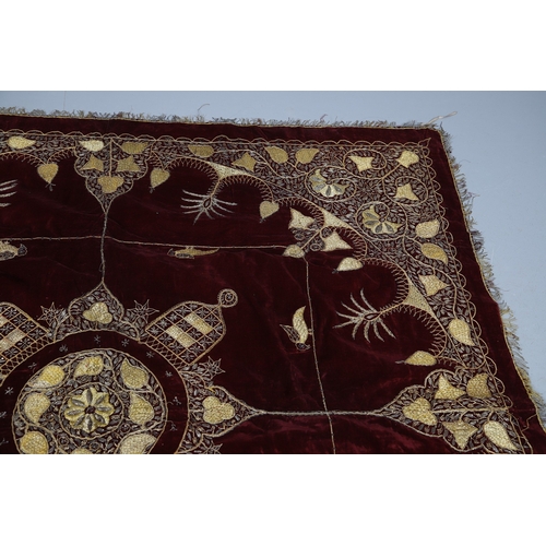 439 - A 19TH CENTURY TURKISH LONG THREAD TABLECLOTH. the embroidered bird and foliate design in gold metal... 