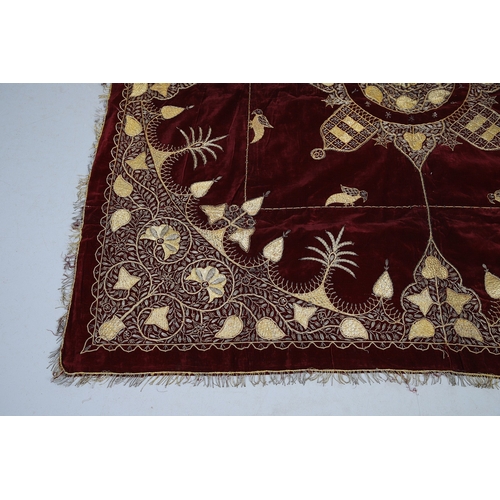 439 - A 19TH CENTURY TURKISH LONG THREAD TABLECLOTH. the embroidered bird and foliate design in gold metal... 
