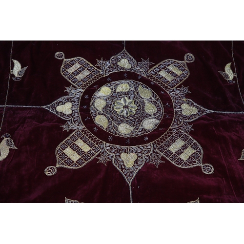 439 - A 19TH CENTURY TURKISH LONG THREAD TABLECLOTH. the embroidered bird and foliate design in gold metal... 