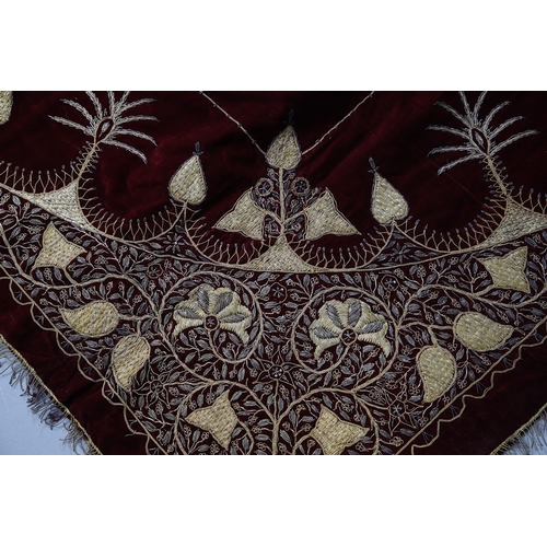 439 - A 19TH CENTURY TURKISH LONG THREAD TABLECLOTH. the embroidered bird and foliate design in gold metal... 