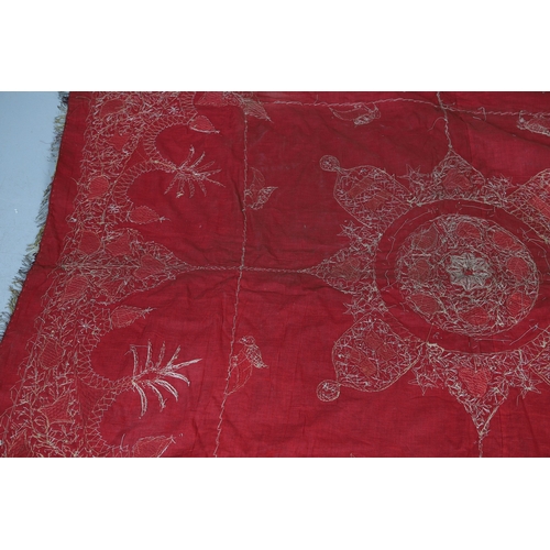 439 - A 19TH CENTURY TURKISH LONG THREAD TABLECLOTH. the embroidered bird and foliate design in gold metal... 