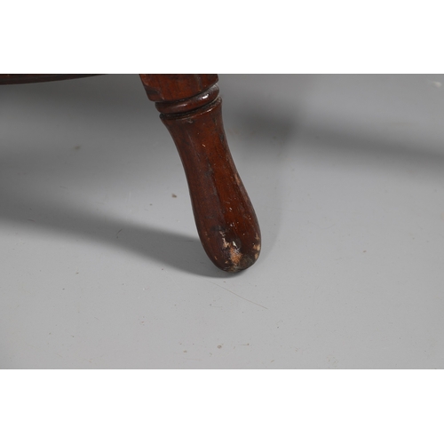 444 - A LARGE MAHOGANY AND BRASS BOUND SHIP'S WHEEL. unattributed, set with two half pennys, dated 1952, 1... 