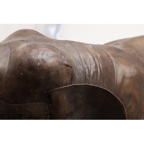 446 - A LARGE LEATHER COVERED ELEPHANT, IN THE STYLE OF OMERSA FOR LIBERTY. with moveable soft leather ear... 