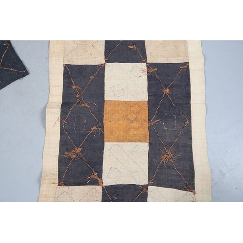 450 - TWO KUBA TEXTILE PANELS (CONGALESE, 20/21ST CENTURY). woven and dyed rafia palm, both embellished wi... 