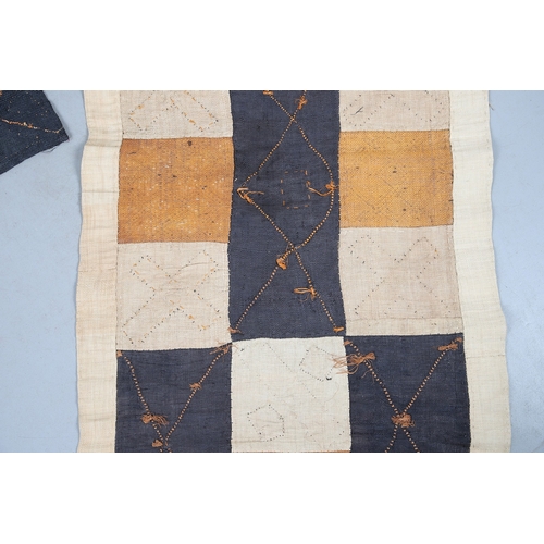 450 - TWO KUBA TEXTILE PANELS (CONGALESE, 20/21ST CENTURY). woven and dyed rafia palm, both embellished wi... 