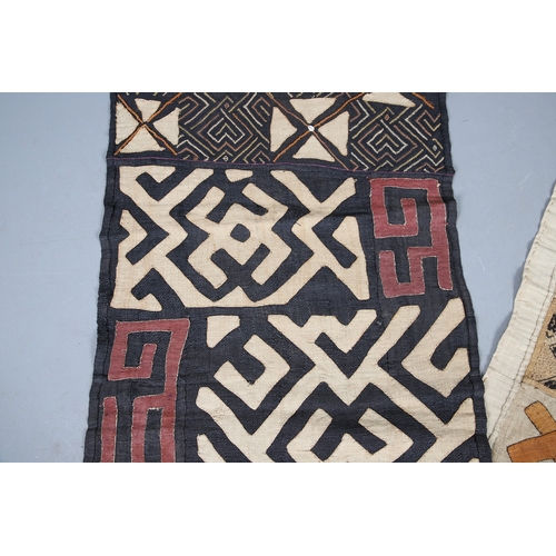 450 - TWO KUBA TEXTILE PANELS (CONGALESE, 20/21ST CENTURY). woven and dyed rafia palm, both embellished wi... 