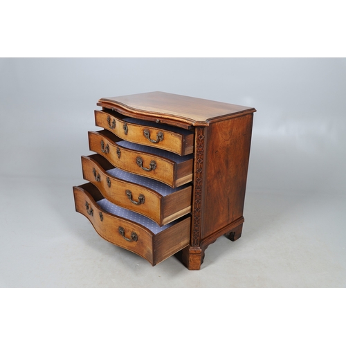 465 - A GEORGE III MAHOGANY SERPENTINE CHEST OF DRAWERS, CIRCA 1750. the top with moulded edge above brush... 