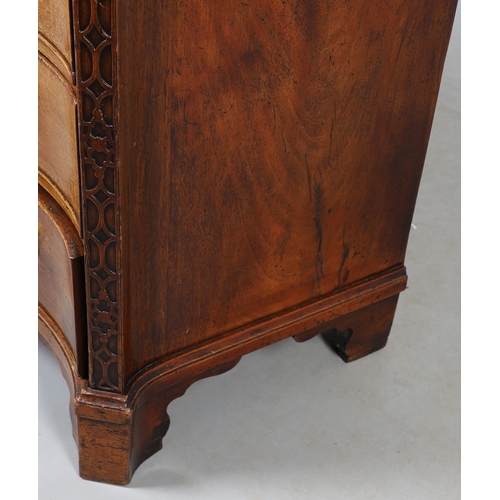 465 - A GEORGE III MAHOGANY SERPENTINE CHEST OF DRAWERS, CIRCA 1750. the top with moulded edge above brush... 