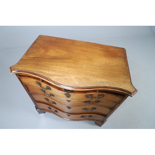 465 - A GEORGE III MAHOGANY SERPENTINE CHEST OF DRAWERS, CIRCA 1750. the top with moulded edge above brush... 