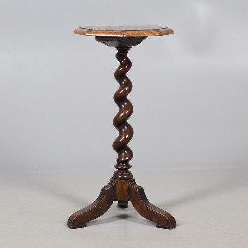 468 - AN 18TH CENTURY WALNUT CANDLESTAND (MARRIAGE). the octagonal oyster veneered to a spiral column and ... 