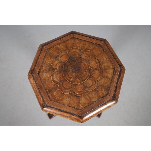 468 - AN 18TH CENTURY WALNUT CANDLESTAND (MARRIAGE). the octagonal oyster veneered to a spiral column and ... 