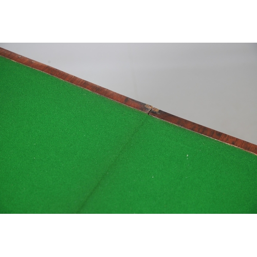 475 - A PAIR OF REGENCY ROSEWOOD AND BRASS INLAID GAMES TABLES. with D-end baize lined swivel tops, inlaid... 