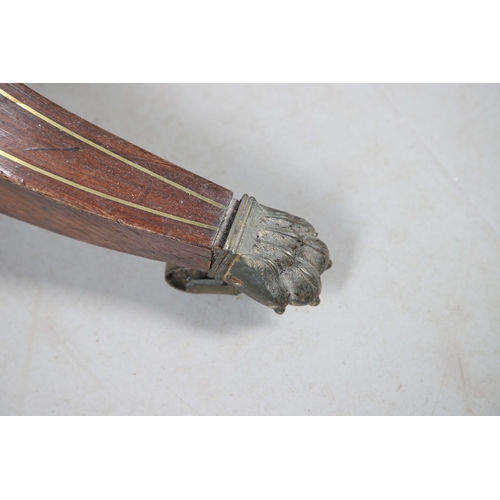 475 - A PAIR OF REGENCY ROSEWOOD AND BRASS INLAID GAMES TABLES. with D-end baize lined swivel tops, inlaid... 