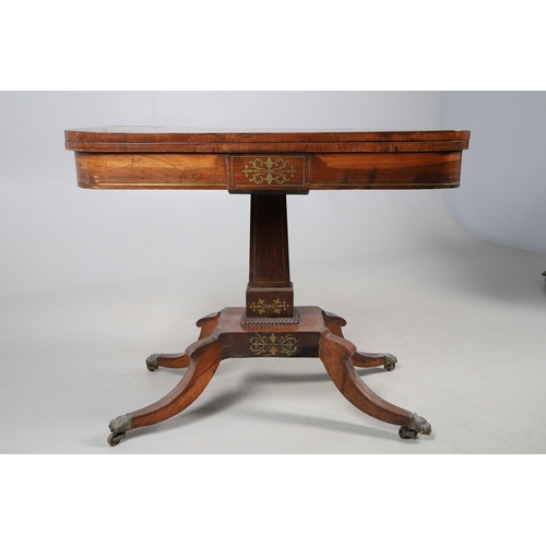 475 - A PAIR OF REGENCY ROSEWOOD AND BRASS INLAID GAMES TABLES. with D-end baize lined swivel tops, inlaid... 