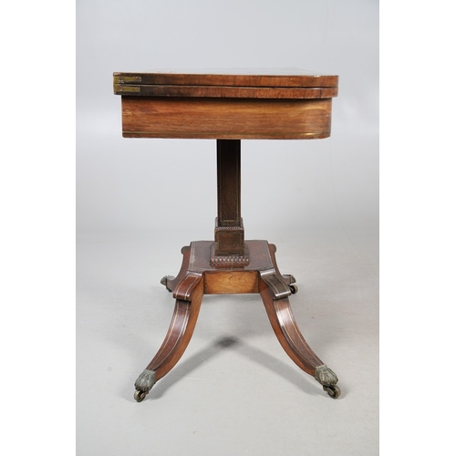 475 - A PAIR OF REGENCY ROSEWOOD AND BRASS INLAID GAMES TABLES. with D-end baize lined swivel tops, inlaid... 