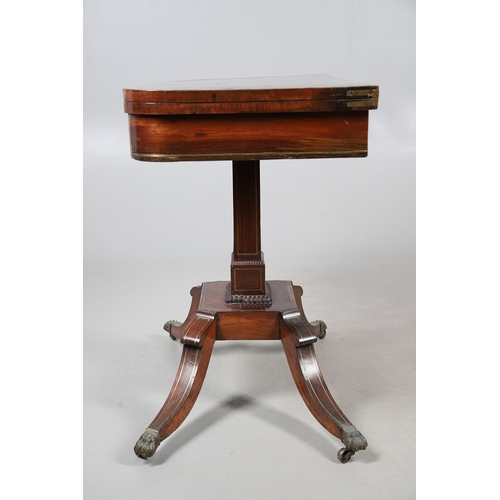 475 - A PAIR OF REGENCY ROSEWOOD AND BRASS INLAID GAMES TABLES. with D-end baize lined swivel tops, inlaid... 